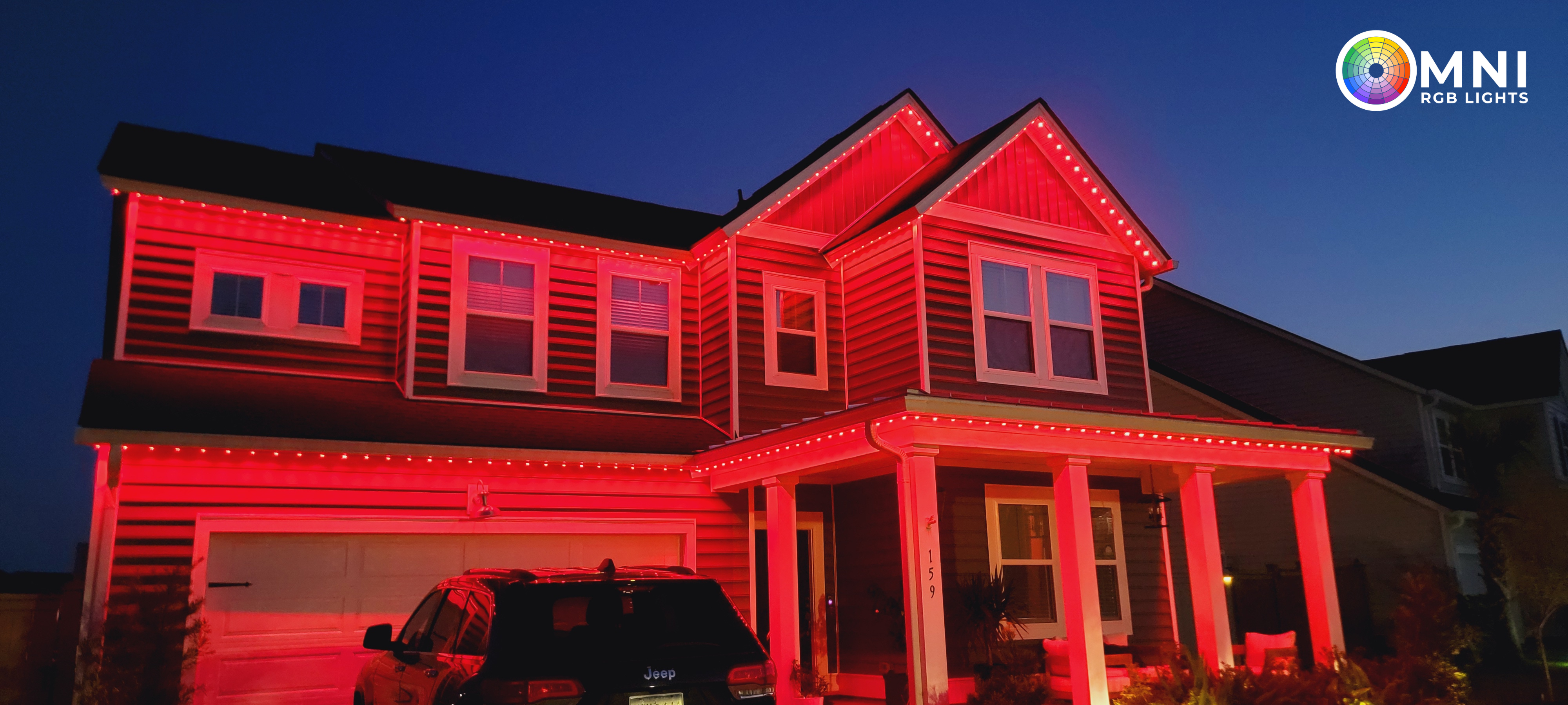 Professionally installed permanent roofline lighting at night