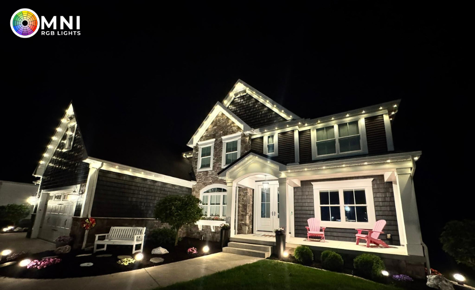 Home illuminated with professionally installed permanent smart outdoor roofline lighting